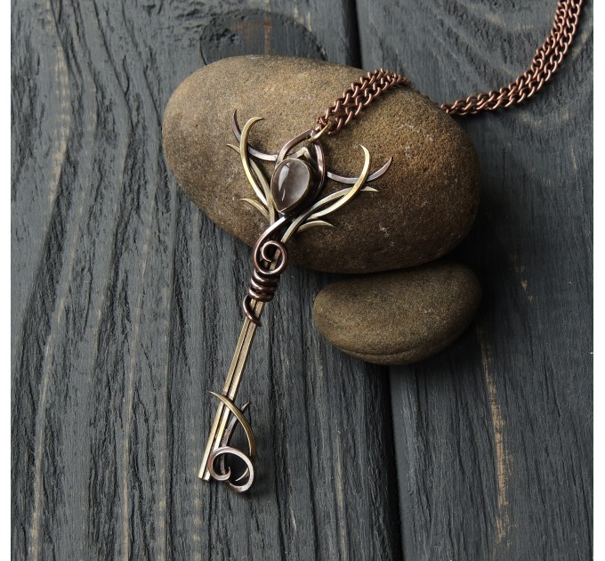 Enchanted key with rose quartz