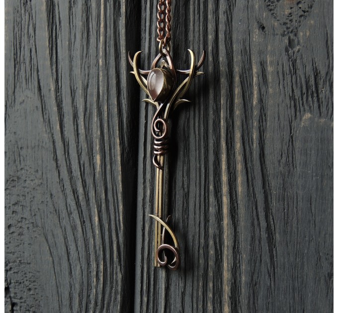 Enchanted key with rose quartz