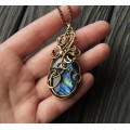 Wire wrapped brass pendant