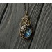 Wire wrapped brass pendant
