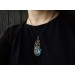 Wire wrapped brass pendant